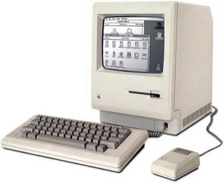 The original Macintosh computer with its one-button mouse