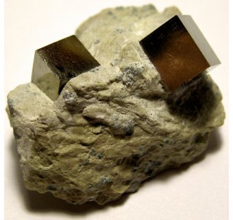 Iron pyrite crystals often form as cubes