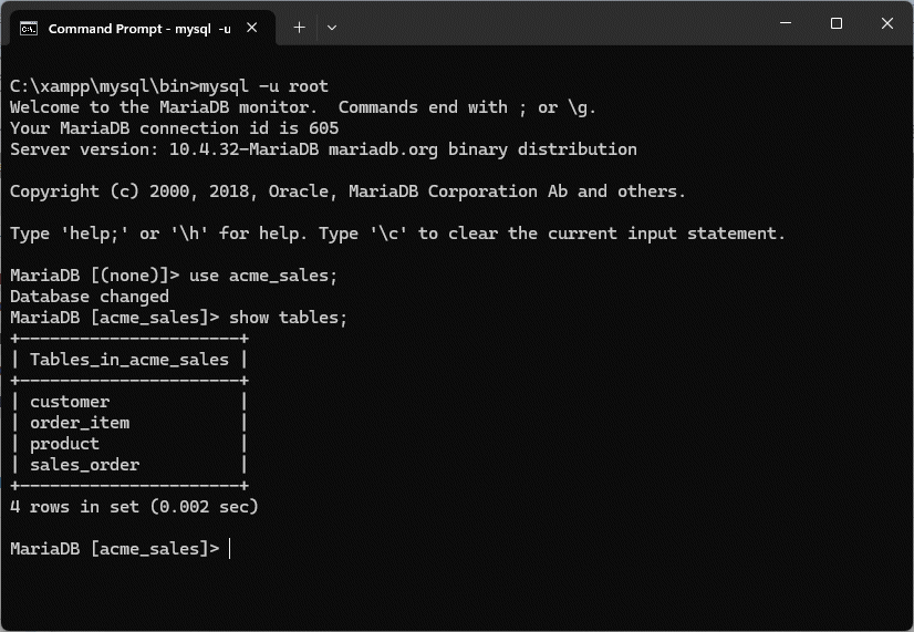 The show tables command lists the tables for the acme_sales database
